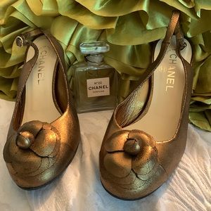 Authentic Channel shoes… open back…. Gold tone and black finish.. Leather